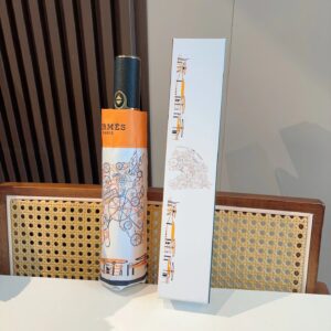 Hermès classic orange printed silk scarf